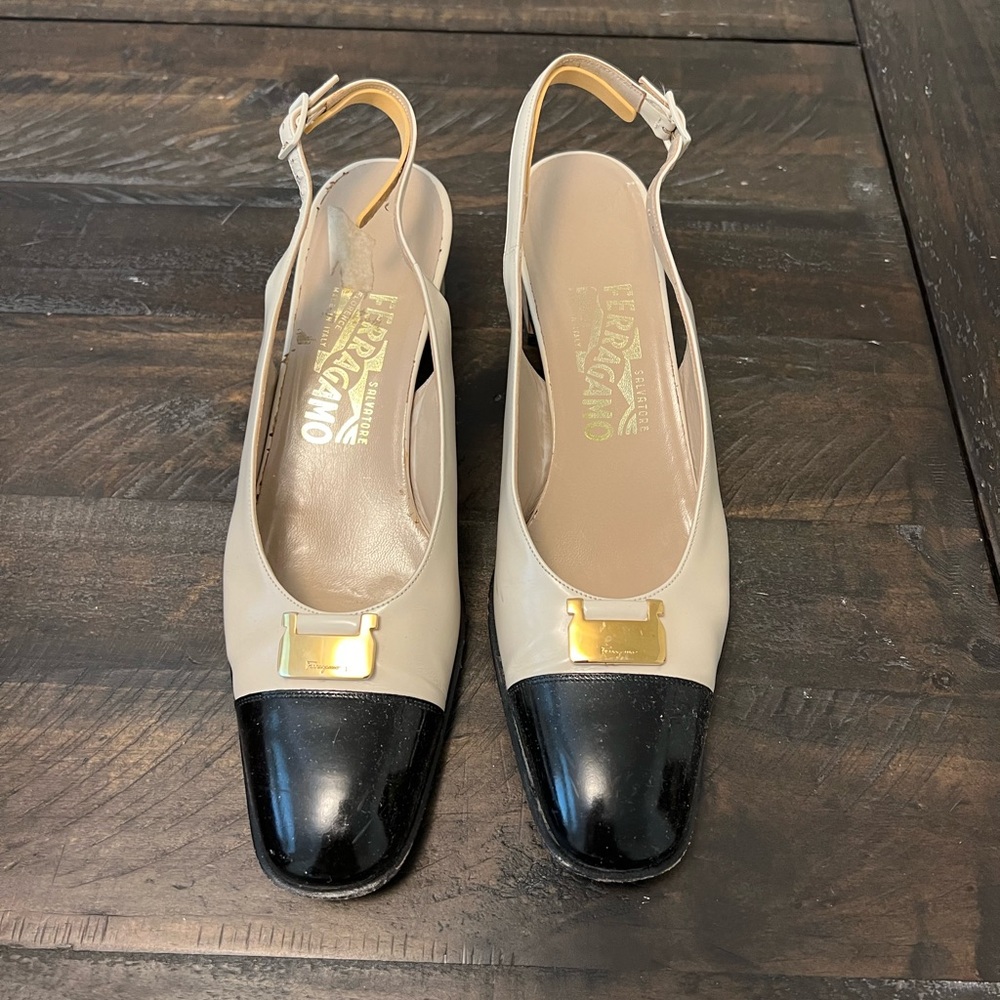 Black and white sling back shoes.